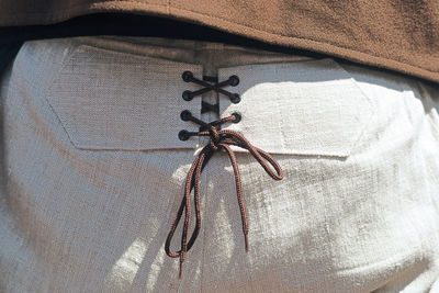 Close-up of  traditional linen costume of musicians in traditional festival, galicia, spain