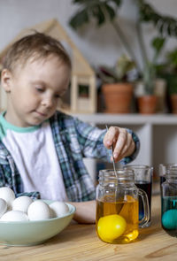 Boy playing with toys at home