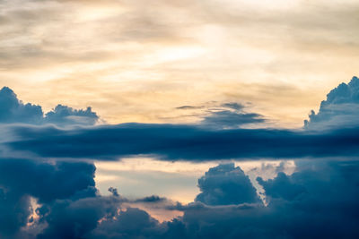 Low angle view of clouds in sky during sunset