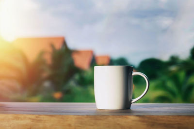 Close-up of coffee cup on table