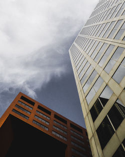 Low angle view of skyscraper against sky