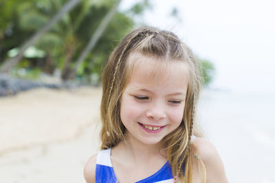 Portrait of smiling girl on beach