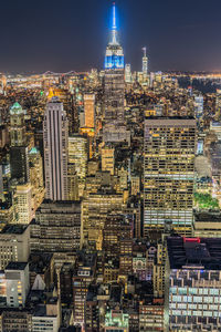 Illuminated buildings in city at night