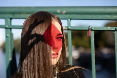 Portrait of young woman outdoors