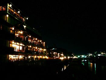 Buildings in city at night