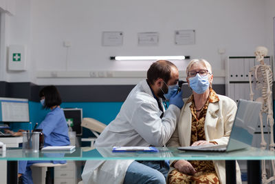 Portrait of doctor standing in laboratory