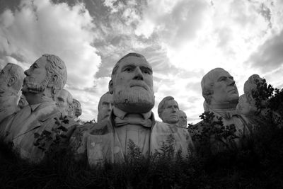 Low angle view of statue against sky