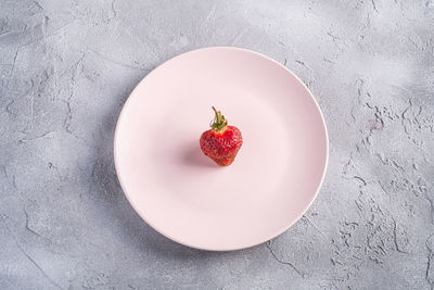 High angle view of fruits in plate on table