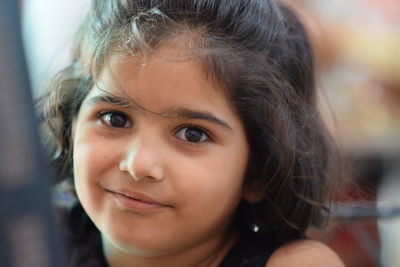 Close-up portrait of cute girl