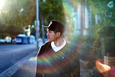 Portrait of young man looking away