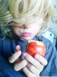 Close-up of girl eating food