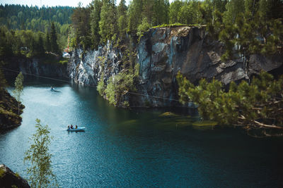 Scenic view of river amidst trees