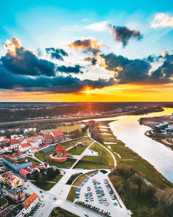 High angle view of buildings against sky during sunset