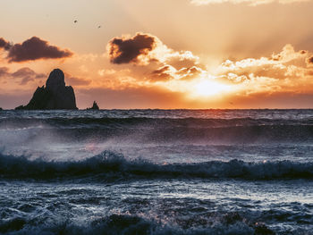 Scenic view of sea against sky during sunset