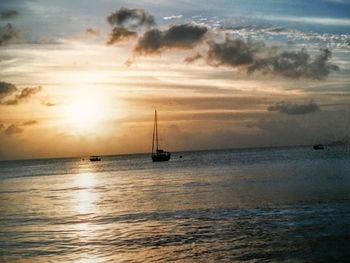 Scenic view of sea at sunset