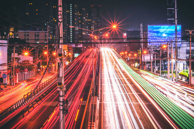 Light trails on city street at night