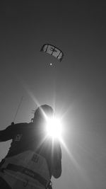 Low angle view of silhouette man against sky during sunset