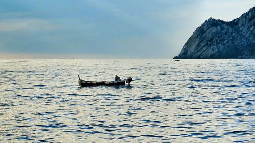 Boat sailing in sea