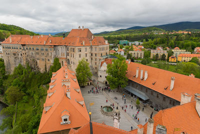 High angle view of townscape against cloudy sky