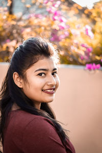 Portrait of a smiling young woman