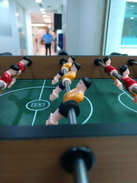 Close-up of foosball indoors