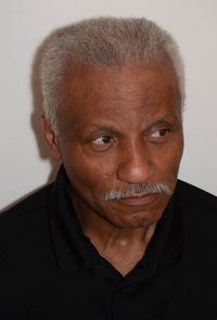 Close up  portrait of african american man looking happy