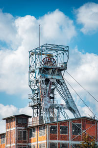 The mine shaft of the mine against the blue sky. knurów, poland