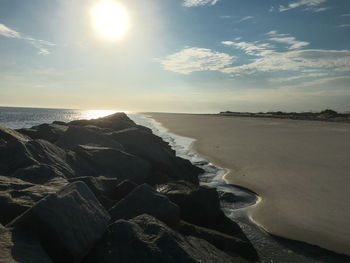 Scenic view of sea against sky at sunset