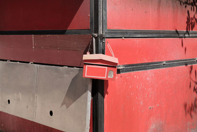 Low angle view of red wall