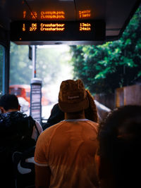 Rear view of people in bus