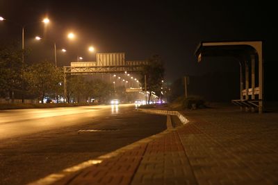 Illuminated street lights at night