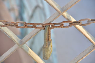 Close-up of rusty metal fence