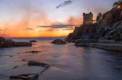 Scenic view of sea against sky during sunset