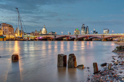 Illuminated buildings at waterfront