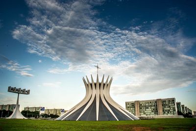 Panoramic view of park against cloudy sky