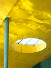 Low angle view of yellow ceiling