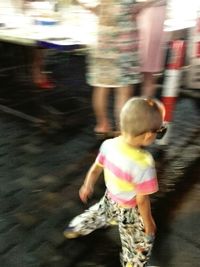 Girl standing in pool
