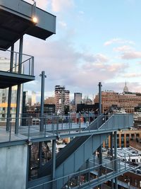 Modern buildings in city against sky