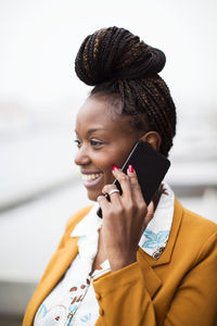 Smiling woman on the phone