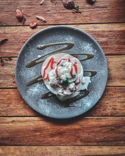 Directly above shot of ice cream served on table