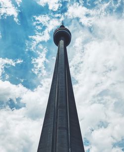 Low angle view of tower against cloudy sky