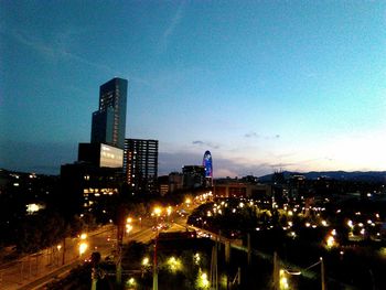 Illuminated cityscape at night