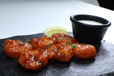 Close-up of served food on table