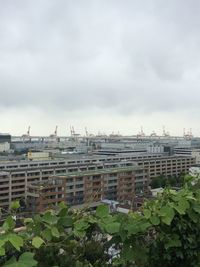 Buildings in city against sky