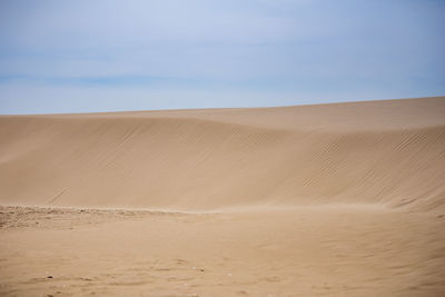 Scenic view of desert against sky