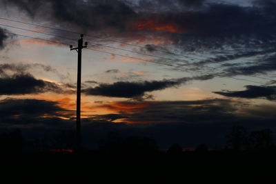 Low angle view of cloudy sky at dusk