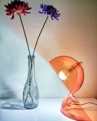 Close-up of flower vase on table