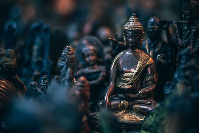 Close-up of buddha statue at market stall