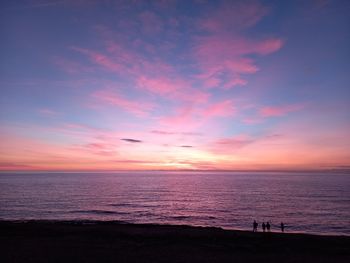 Scenic view of sea against sky during sunset blu and pink