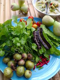 Close-up of fruits in plate on table